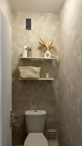 Photo de galerie - Pose de papier peint chez une cliente 