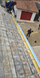 Photo de galerie - Pause de gouttière en zinc 
