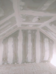 Photo de galerie - Pose des bandes (enduits)