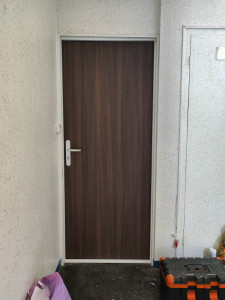 Photo de galerie - Pose porte d'entrée palière 