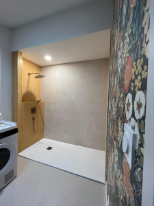 Photo de galerie - Rénovation d’une salle de bain installation d’un mitigeur encastré hansgrohe