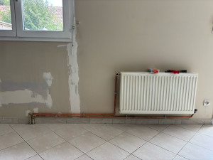 Photo de galerie - Appeller pour un déplacement de radiateur de salon. APRÈS 