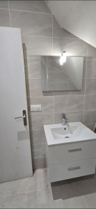 Photo de galerie - Installation meuble vasque