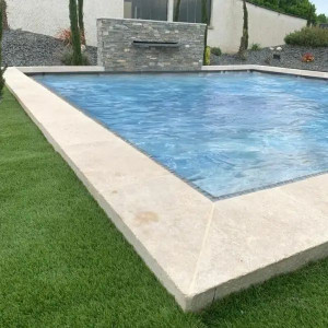 Photo de galerie - Pose de margelles de piscine 