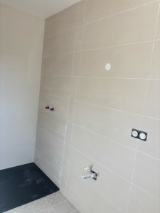Photo de galerie - Pose de carrelage dans salle de bain