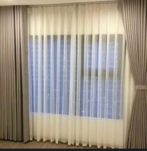 Photo de galerie - Confection de rideaux sur mesure et travaux de couture. Retouches et réparations de vêtements : ourlets de pantalons, ajustements et petites réparations. 