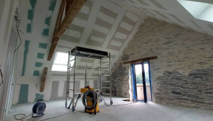 Photo de galerie - Réalisation d un comble amenageable avec isolation plaquage et jointoyage