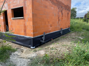 Photo de galerie -     Réalisation de drainage périphérique avec protection des murs de soubassement.