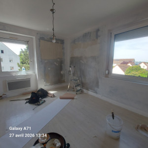Photo de galerie - Parquet clipsable, ainsi que montage du mobiliers installation tv mural , plafonnier etc...
