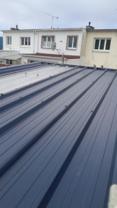 Photo de galerie - Pose bac acier