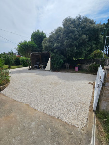 Photo de galerie - Réalisation d'une cours en gravier 