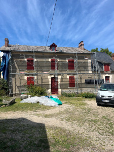 Photo de galerie - Remplacement de couverture en ardoises.