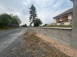 Photo de galerie - Fondation montage de bloc creux et couvertine 