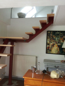 Photo de galerie - Escalier acier et bois
avec limon central