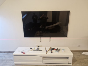 Photo de galerie - Accrochez une télé en mure