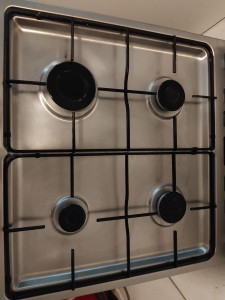 Photo de galerie - Nettoyage d'une plaque de cuisson