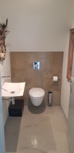Photo de galerie - Installation d un toilette suspendu refection des murs peinture béton ciré et ses branchements 