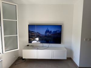 Photo de galerie - Fixation meuble et tv sur le mur 