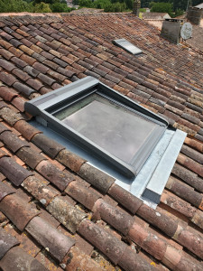 Photo de galerie - Changement velux avec entourage
 zinc 