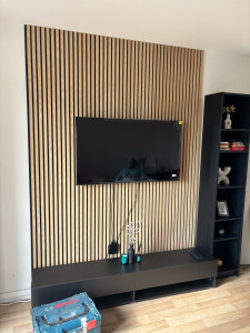 Photo de galerie - Installation des panneaux plus  la télé