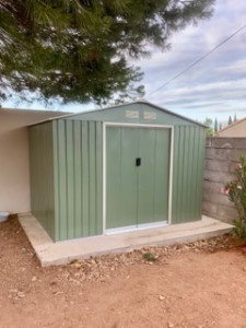 Photo de galerie - Création de la dalle en béton/ montage de l’abri de jardin  