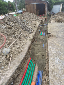 Photo de galerie - Pose de plusieurs réseaux afin d'alimenter 4 logements.
EDF
branchement d'eau 
branchement fibre