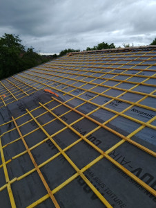 Photo de galerie - Pose du pare pluie et pose du lattage et litonnage 