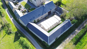 Photo de galerie - Reprise de toiture en ardoise naturel et fibro de 1200m2