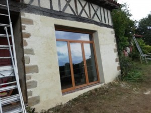 Photo de galerie - Ouverture avec pose du linteaux, pose de la baie vitrée et crépis de finition