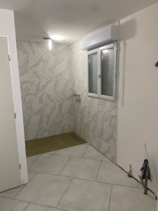 Photo de galerie - Transformation salle de bain création douche italienne et carrelage mural et sol