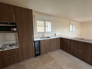 Photo de galerie - Installation d'une cuisine en L.