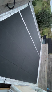 Photo de galerie - Réalisation d’une toiture-terrasse avec étanchéité bitumineuse autoprotégée