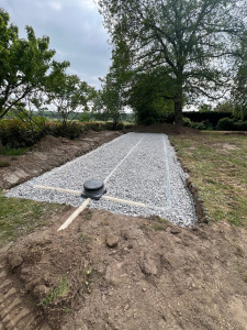 Photo de galerie - Réalisation d’un lit d’épandage assainissement 