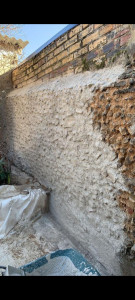 Photo de galerie - Réparation enduit rejointement de mur de pierre entièrement réalisé à la chaux blanche 