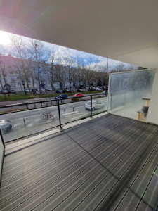 Photo de galerie - Réalisation de terrasse avec pose de lame de bois composite