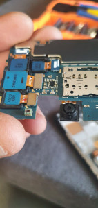 Photo de galerie - Changement de carte mère téléphone portable 