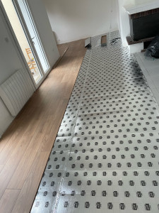 Photo de galerie - Pose de parquet avec soucouche et plainte  