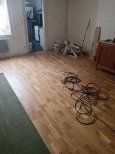 Photo de galerie - Réalisation sols en parquet bois 8mm