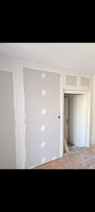Photo de galerie - Mise en place de ba13 sur ossature suivie de joints 3 passes. 