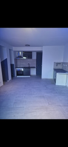 Photo de galerie - Séjour avec cuisine ouverte 