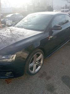 Photo de galerie - Audi A5 présentant des dommages au niveau de la carrosserie. Réparation, remise en état et finition de la carrosserie afin de retrouver un rendu propre et conforme à l’origine.
