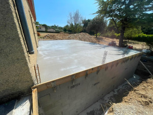Photo de galerie - Réalisation d’un plancher béton 