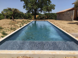 Photo de galerie - Pose de revêtement armé avec volet immergé 