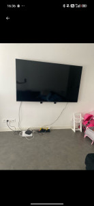 Photo de galerie - Fixation d'une TV au mur 
