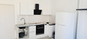 Photo de galerie - Montage et fixation meubles hauts de cuisine + hotte. 