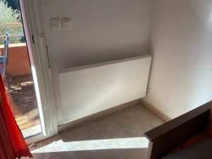 Photo de galerie - Installation de radiateurs électriques connectés