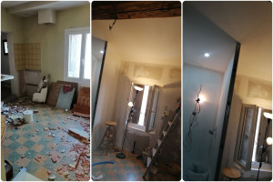 Photo de galerie - Transformation du sol au plafond d'une cuisine en chambre avec espace douche.