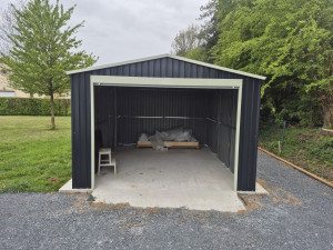 Photo de galerie - Montage garage metalique avec rideau 