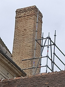 Photo de galerie - Rénovation d’une cheminé en brique 