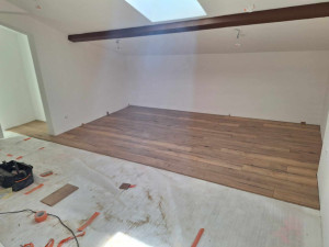 Photo de galerie - Pose sous couche et parquet